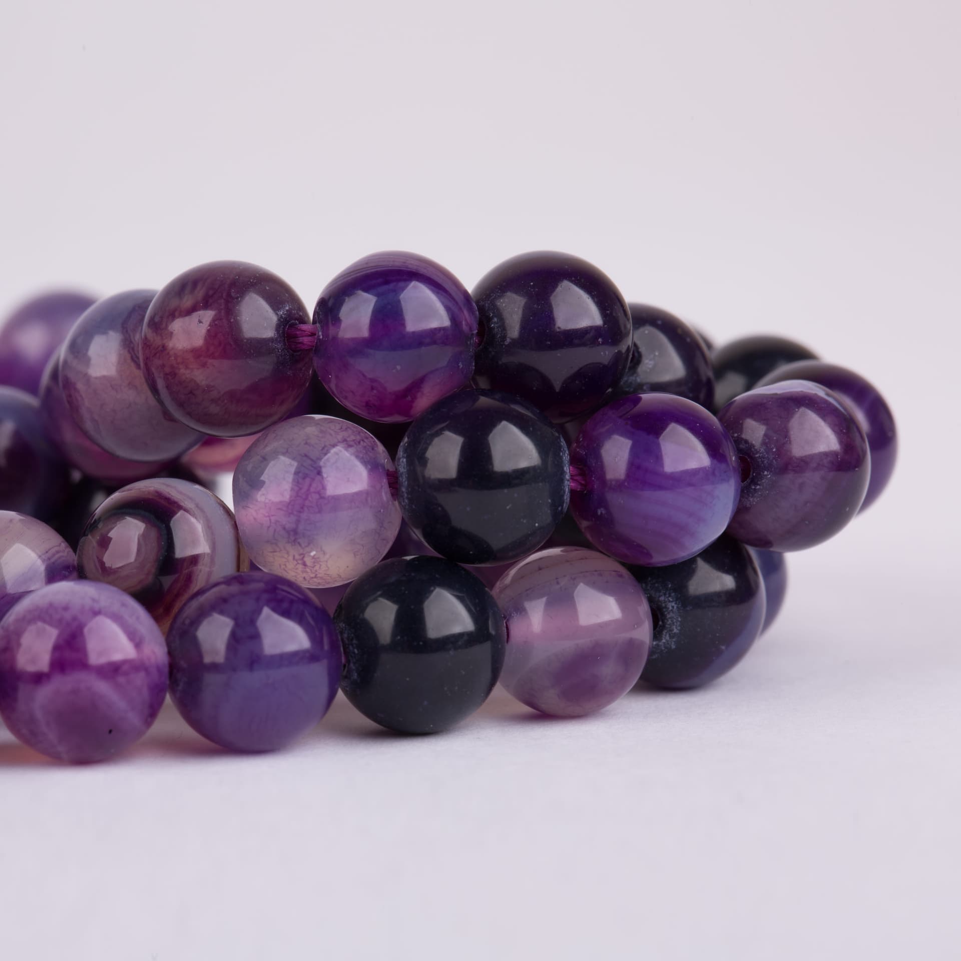 تسبیح عقیق سه پوسته 8 میل 100 تایی گرد — تصویر 2